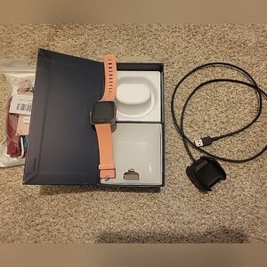 Fitbit Versa Smartwatch with Peach Band and extra bands